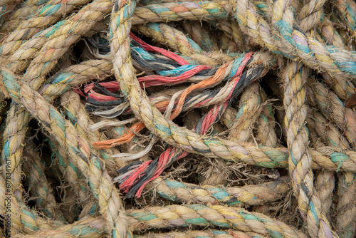 Pile of fishing rope and nylon netting. Close up view