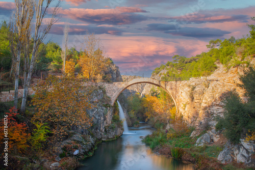 Turkey's waterfalls and rivers. historic stone bridge and waterfall. great photo where nature and architecture meet. Clandras bridge and Clandras waterfall. Usak , Turkey