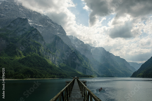lake in the mountains with bridge background