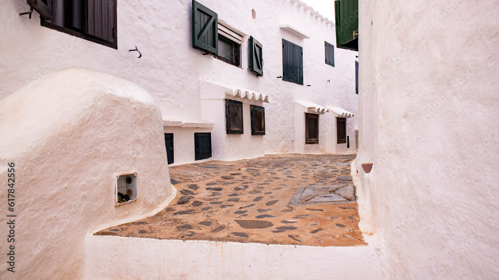 Fototapeta premium View of the alleys of the fishing village of Binibeca Vell, Menorca, Spain