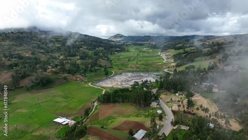 Aerial view of the green field with a Oxidation pondin the peruvian andes (3200 m.a.s.l.) photo