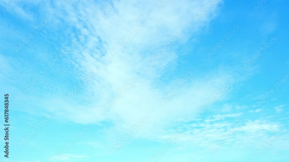 The ethereal charm of a time-lapse video capturing the ever-changing canvas of a vivid blue sky, dotted with wispy, drifting clouds, a captivating symphony of nature's dynamic artistry. Timelapse. 4K
The ethereal charm of a time-lapse video capturing the ever-changing canvas of a vivid blue sky, dotted with wispy, drifting clouds, a captivating symphony of nature's dynamic artistry. Timelapse. 4K