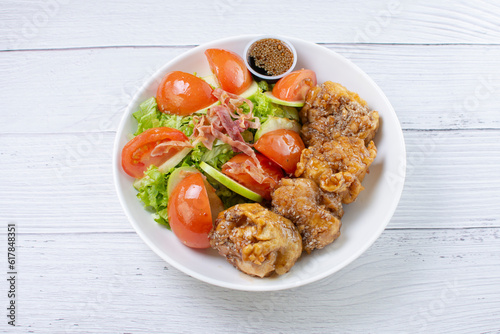 Obraz na płótnie protein bowl and salad, accompanied by pieces of chicken in sweet and sour sauce, tomatoes in lemon, lettuce, apple, pieces of bacon in teriyaki sauce w salonie