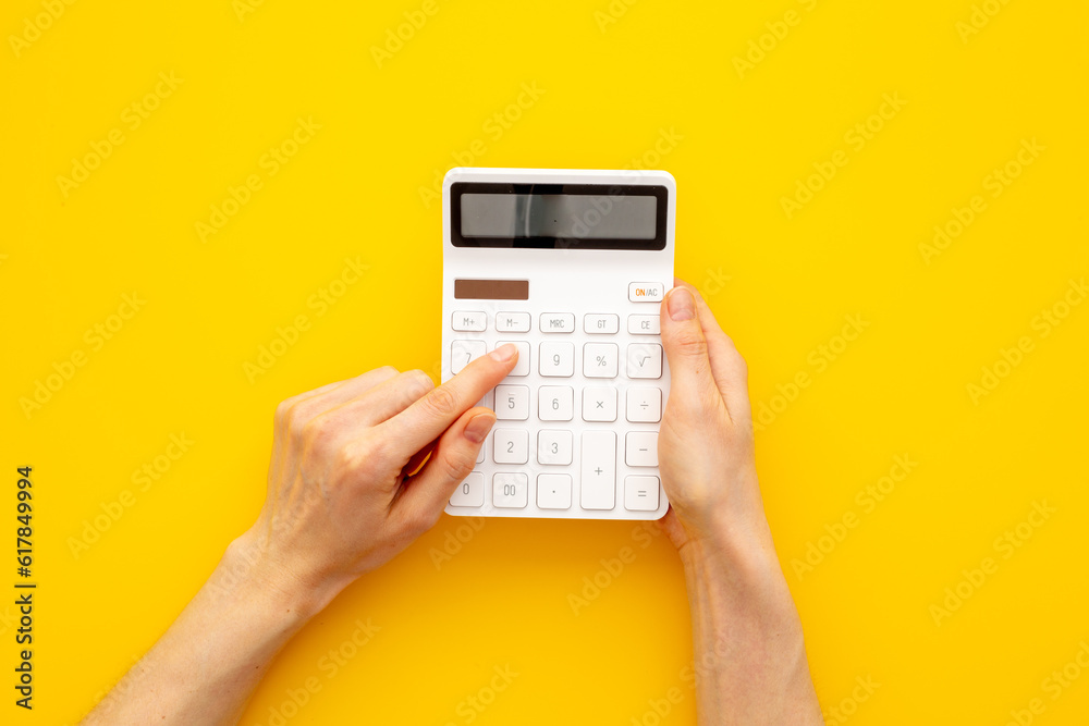 Business accounter working with calculator for taxes accounting Business accounter working with calculator for taxes accounting