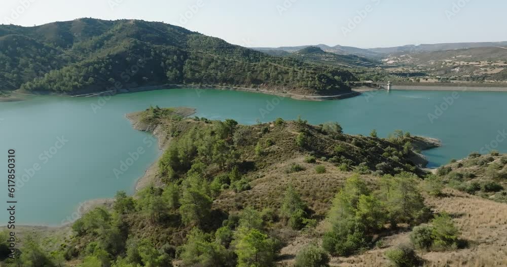 Island Oasis: Aerial Exploration of a Serene Mountain Lake, Essential Dam, and Potable Water Reservoir on Cyprus Island. High quality 4k footage Island Oasis: Aerial Exploration of a Serene Mountain Lake, Essential Dam, and Potable Water Reservoir on Cyprus Island. High quality 4k footage