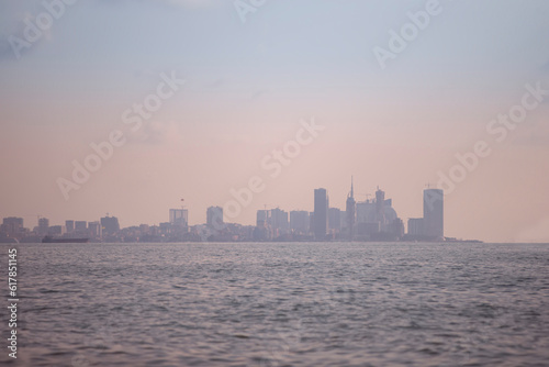View of a modern city in the sea mist.