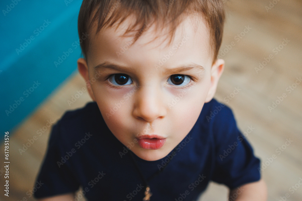Emotions on the face of a two-year-old little boy, an emotional child. A boy with different grimaces on his face. Emotions on the face of a two-year-old little boy, an emotional child. A boy with different grimaces on his face.
