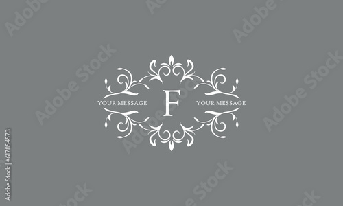 An elegant floral monogram design template for one or two letters, for example F. Wedding monogram. Vector illustration of the logo. photo