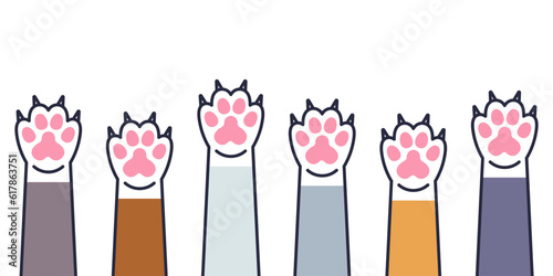 Set of cute cat paws with claws in vector. Cat paws with claws in different colors in flat linear style. Cute cat paw icons.