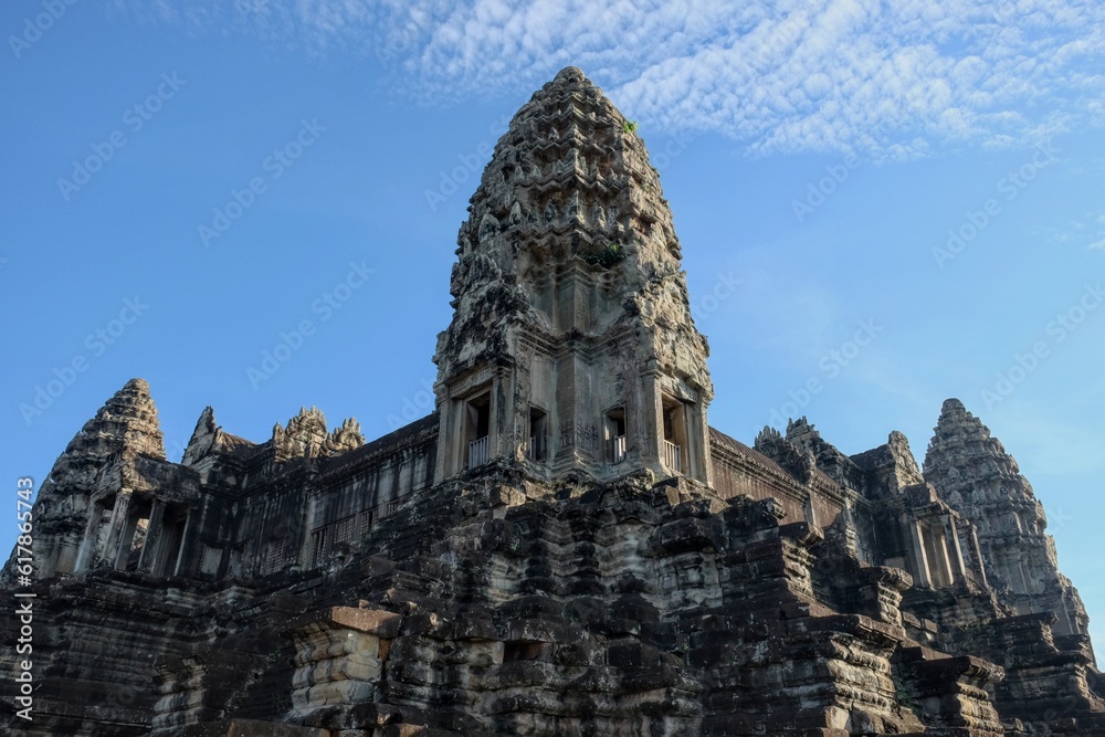 Stone tower of Angkor Wat, Cambodia, blue sky.