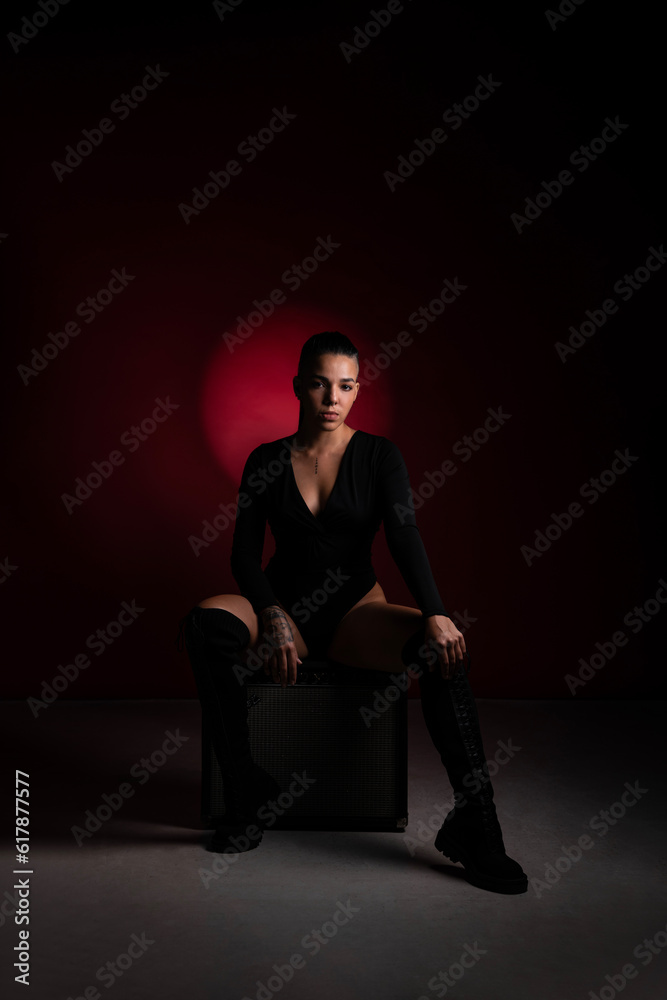 Artistic photography of beautiful female drummer who loves music Artistic photography of beautiful female drummer who loves music