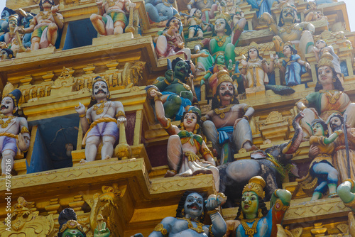 Colorful figures on a Hindu temple photo