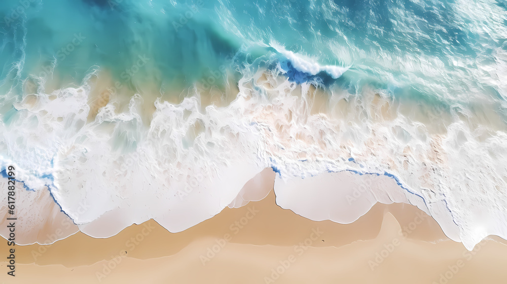Fototapeta premium Satellite view of a beach with blue water, white waves and golden sand