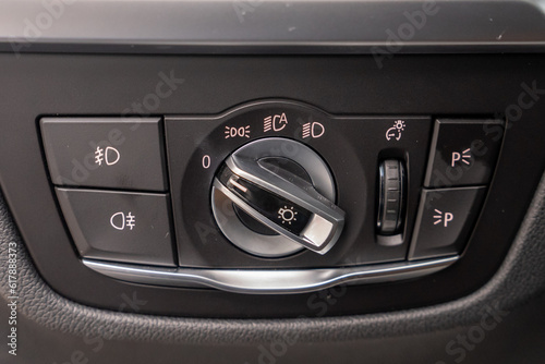 close up of  a car control headlights  © Universeal