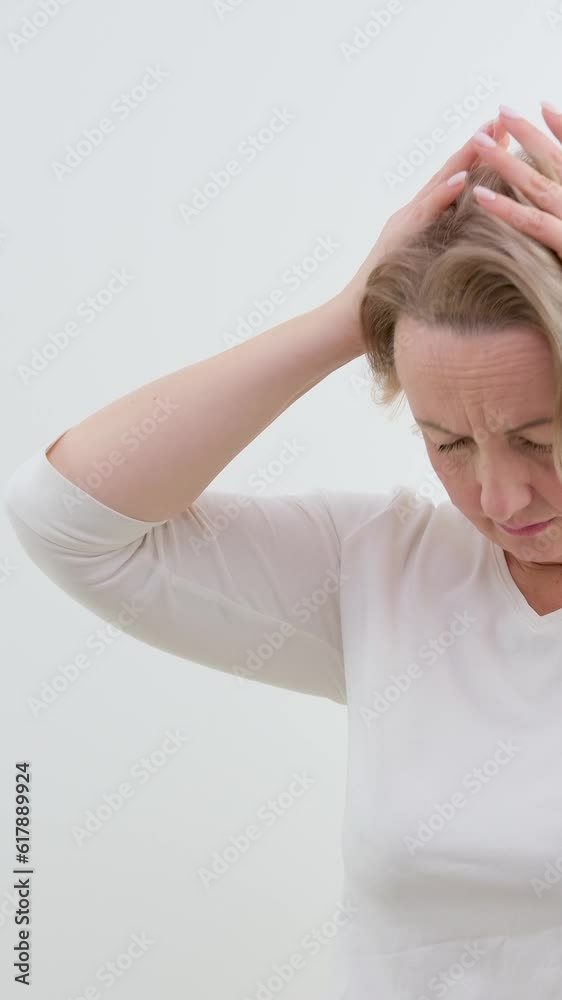 severe headache migraine woman holding hands temple eyes closed wrinkle