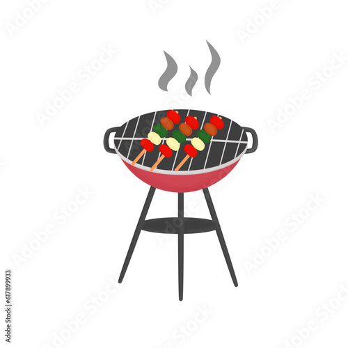 barbecue grill with meat on stick