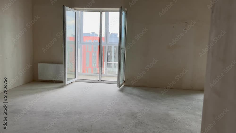 New empty apartment in block of flats, condominium with clean walls and windows New empty apartment in block of flats, condominium with clean walls and windows