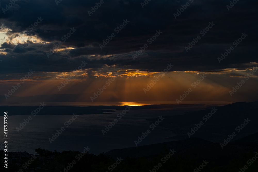 Dramatic clouds in a sunset storm over the Croatian coast.