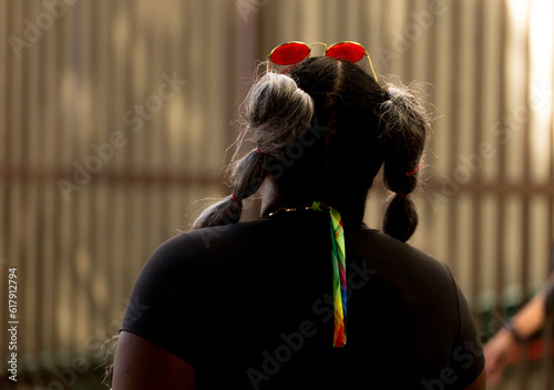 Pele preta, transas, óculos vermelho e fita colorida fantasias na 27ª Parada do Orgulho LGBT+ Avenida Paulista, São Paulo, Brasil. photo