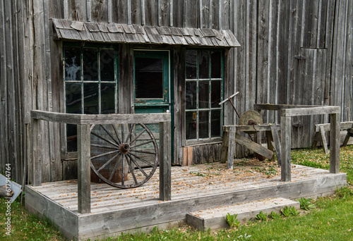 blacksmith shop with cart wheels outside Scugog Shores Port Perry Ontario photo