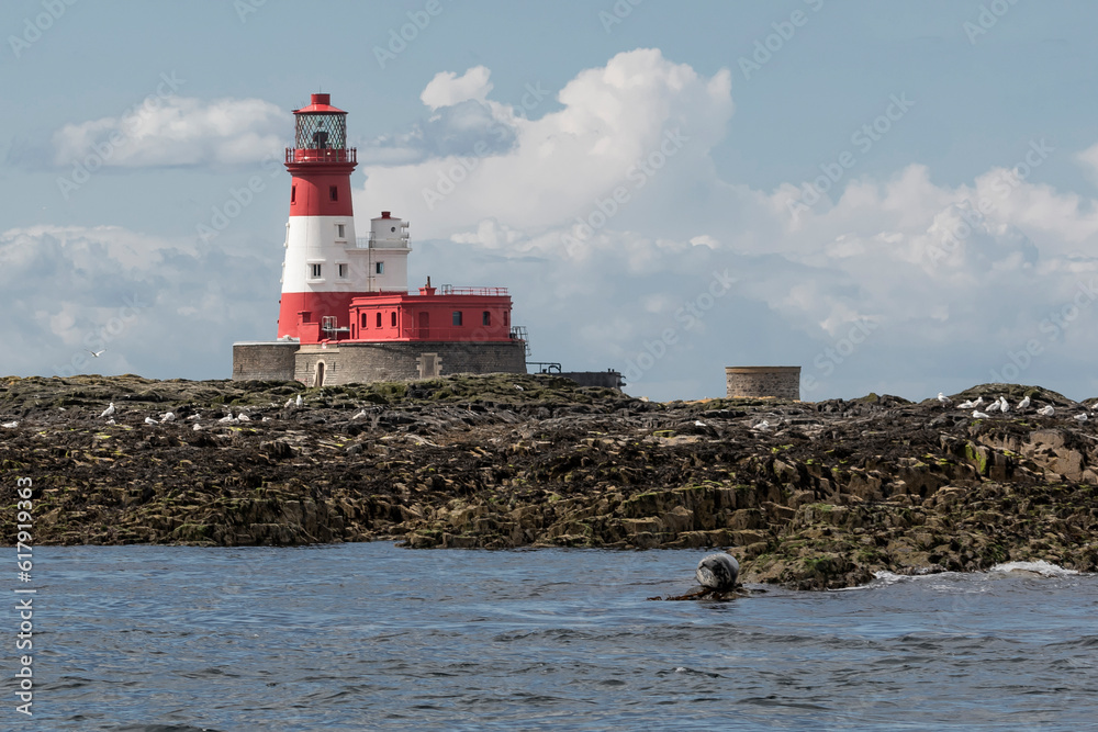 Red and white lighthouse on one of the Farne Islands