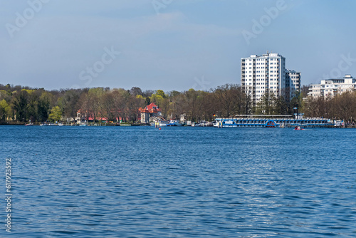 Photography Tegeler See with the riverboat station at a shore trail Greenwichpromenade in Be