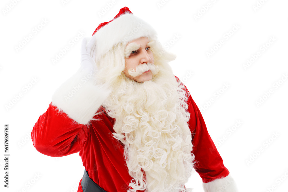 Santa Claus listens with a hand to the ear on a white background Christmas.