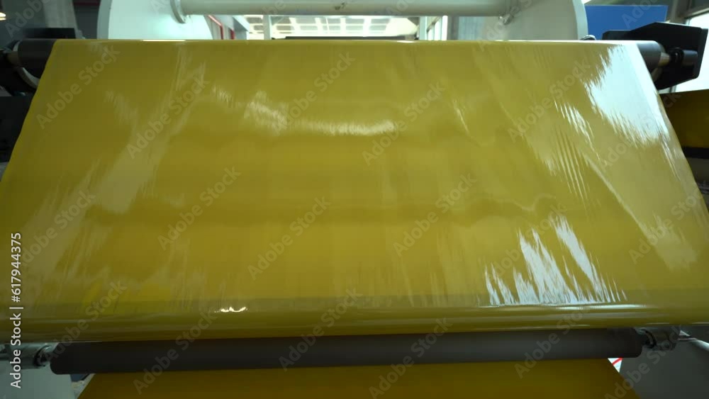 Duct tape production plant. Massive metal fasteners holding the