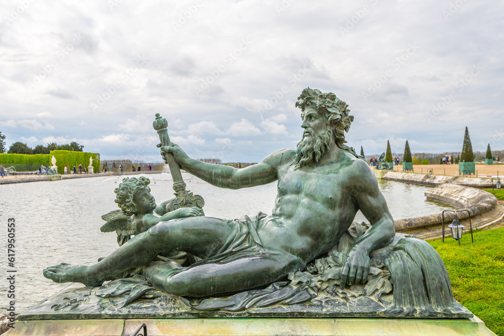 Rhone statue at The Water Garden in the Gardens of Versailles, Chateau Versailles near Paris, France.