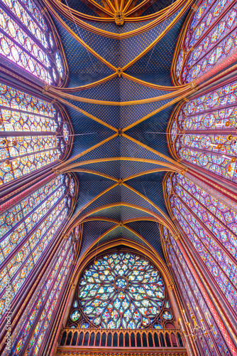 Monumental interior of Sainte-Chapelle with stained glass windows, upper level of royal chapel in the Gothic style. Palais de la Cite, Paris, France © pyty