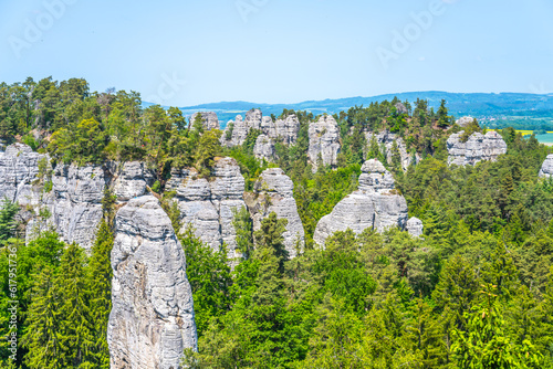 Panoramic view of a sandstone rock city in Bohemian Paradise, Czech: Cesky raj. View of Band, Czech: Kapela, rock formation on sunny summer day. Czech Republic