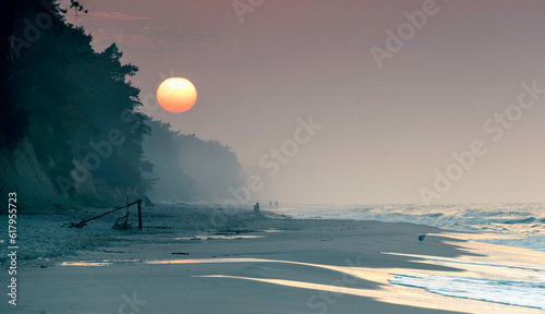 Fototapeta Naklejka Na Ścianę i Meble -  Beautiful sunrise over the Baltic Sea. The landscape on the Baltic Sea.