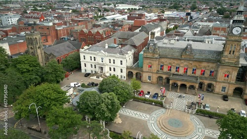 Southport, Lancashire, UK, June 19, 2023; Mid-level aerial orbital clip video footage of Southport town hall, the Atkinson Gallery and library in Southport, England photo