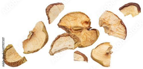 Falling dried apple slices isolated on white background