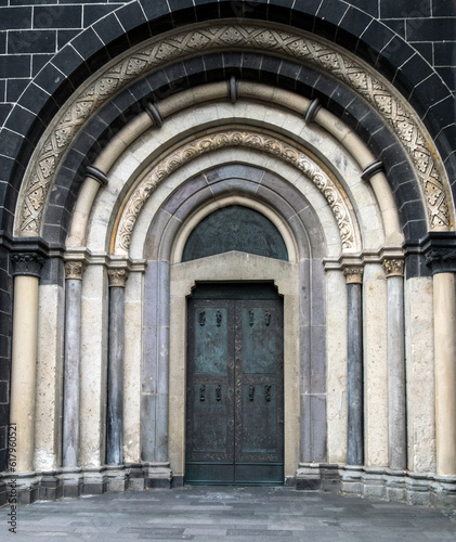 Seitenportal an der Kirche St. Quirinus in Neuss photo