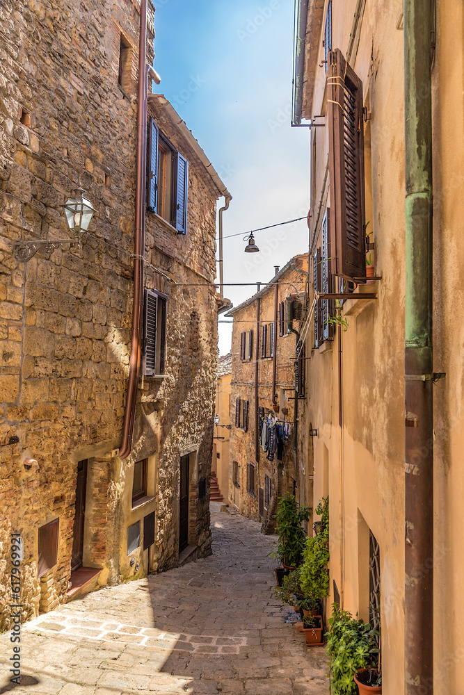 Volterra, Italy. Colorful narrow street of a medieval city