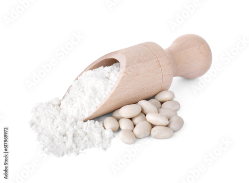 Wooden scoop with flour and kidney beans isolated on white