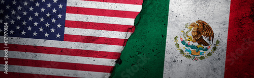 wall painted with the flag of usa and mexico divided by a crack