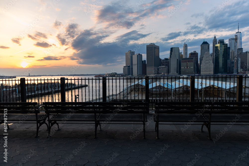 Lower Manhattan Skyline during a Sunset seen from the Brooklyn Heights Promenade in New York City