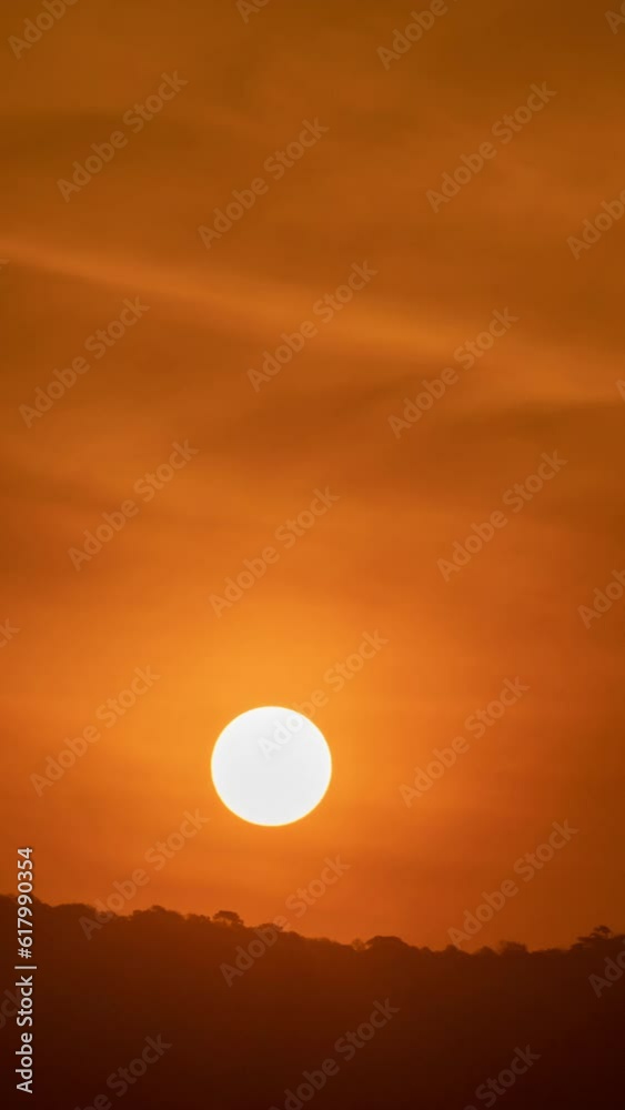 Timelapse of dramatic sunrise with orange sky in a sunny day. Timelapse of dramatic sunrise with orange sky in a sunny day.