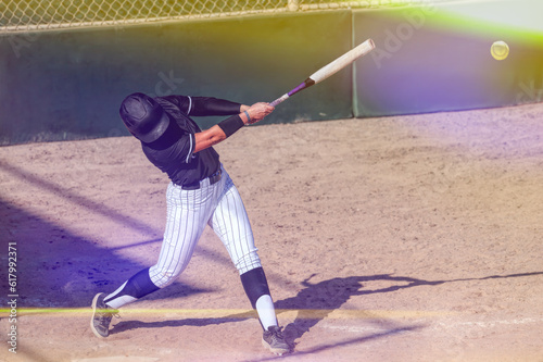Softball Player Fast Pitch Action Athlete Playing Batter Hitting Baseball