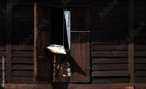 Fotografie traditional malay wooden house window