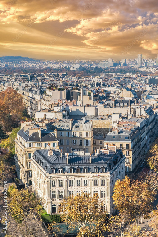 Paris, beautiful Haussmann facades and roofs in a luxury area of the capital, view from the triumph arch
