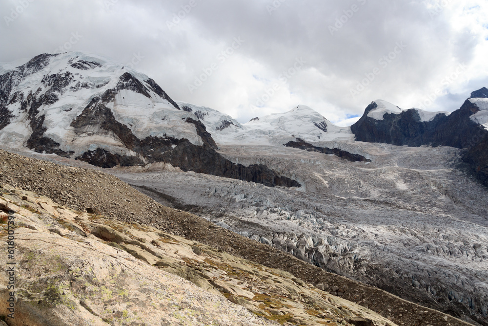 Panorama view with mountains Lyskamm (left), Castor (middle), Pollux (left) and glacier Zwillingsgletscher in mountain massif Monte Rosa in Pennine Alps, Switzerland
