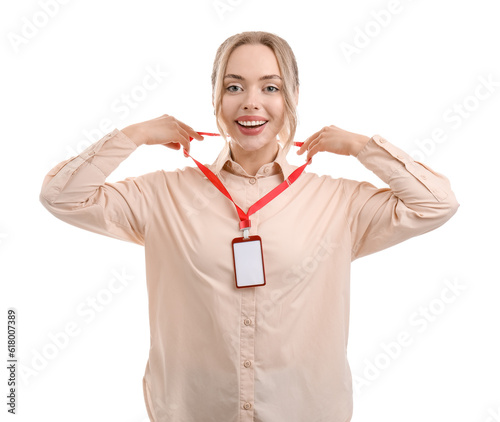 Young woman with blank badg...