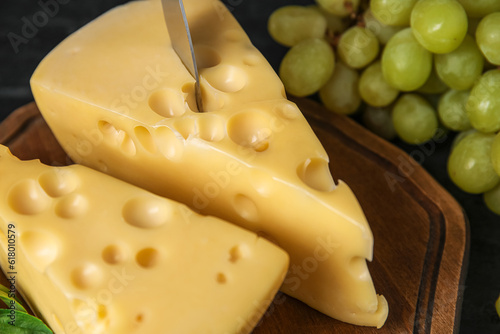 Emmental cheese wedge with ...