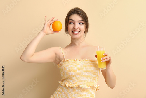 Young woman with glass of j...