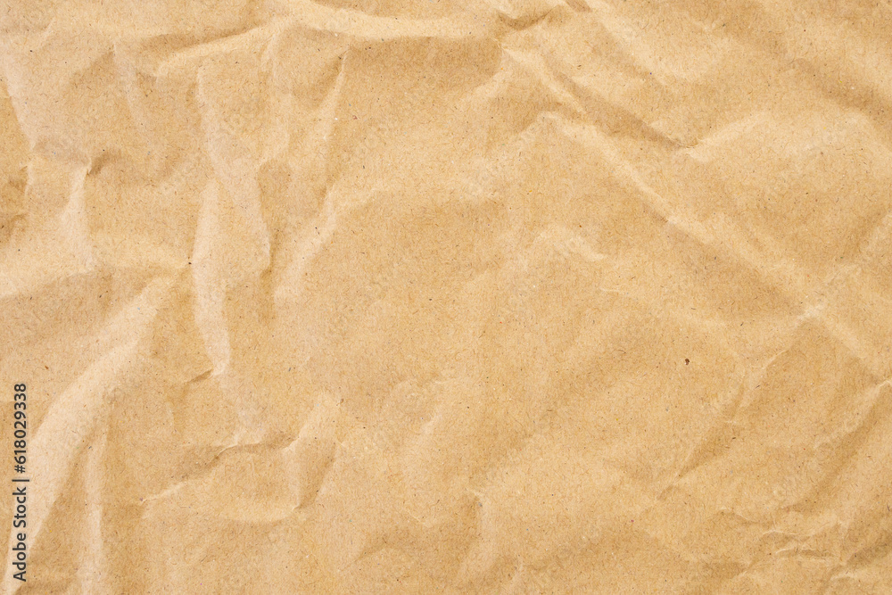 Abstract brown crumpled creased recycle paper texture background Abstract brown crumpled creased recycle paper texture background