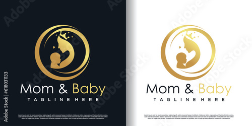 Mom and baby logo design with creative concept premium vector