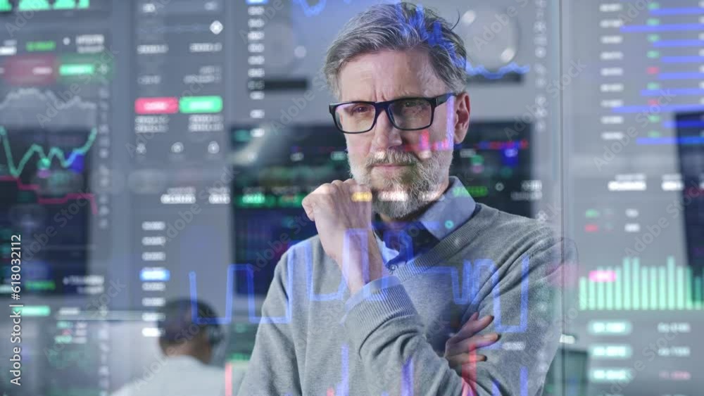 Focused investment specialist analyzes cryptocurrency charts in modern office. 3D render of real-time stocks on glass wall. VFX futuristic animation. Computers and big digital screens on background.
